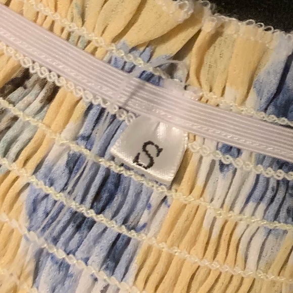 A floral romper. - Picture 3 of 3